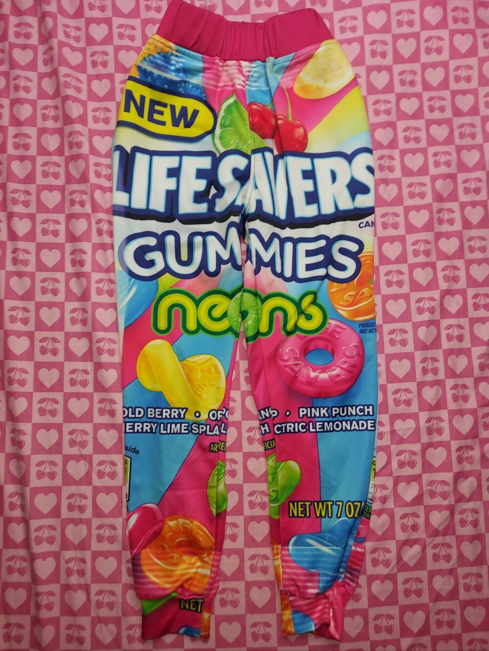 Life Savers Gummies Candy Graphic jogger pants featuring a neon wrapper design
